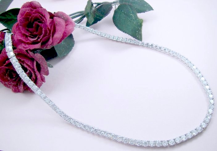 �L���[�r�b�N�W���R�j�A�@�e�j�X�l�b�N���X