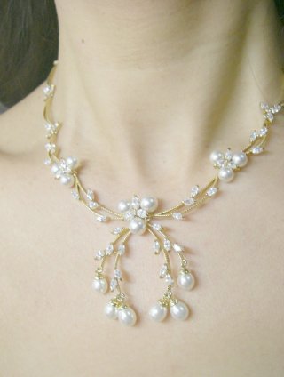 �L���[�r�b�N�W���R�j�A�ƃ}�W�����J�E�p�[���̃l�b�N���X