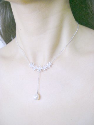 �L���[�r�b�N�W���R�j�A�ƃ}�W�����J�E�p�[���̃l�b�N���X