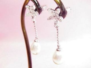 �L���[�r�b�N�W���R�j�A�ƃ}�W�����J�E�p�[���̃s�A�X