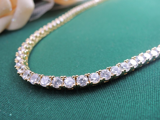 �S�[���h�e�j�X�l�b�N���X�@�L���[�r�b�N�W���R�j�A�E�A�N�Z�T���[