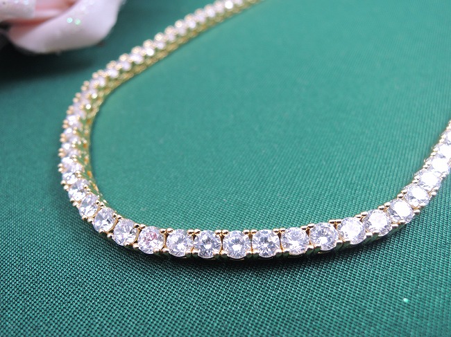 �S�[���h�e�j�X�l�b�N���X�@�L���[�r�b�N�W���R�j�A�E�A�N�Z�T���[