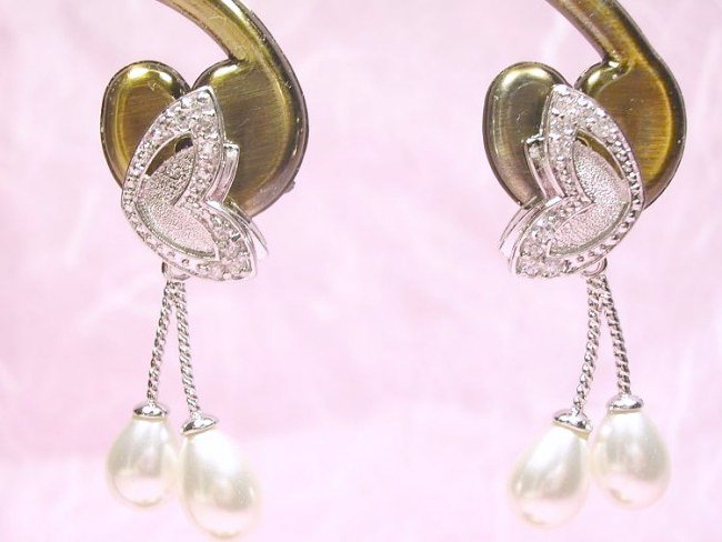 �L���[�r�b�N�W���R�j�A�ƃ}�W�����J�E�p�[���̃s�A�X