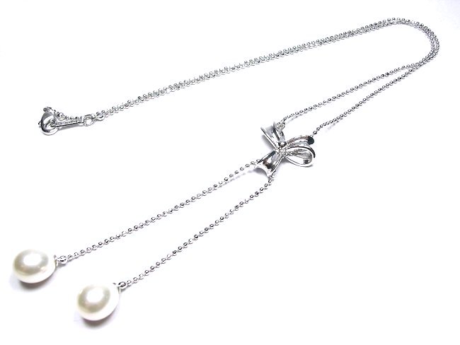 ���{�����`�[�t�@�p�[���ƃL���[�r�b�N�W���R�j�A�̃l�b�N���X