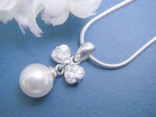 �p�[���ƃL���[�r�b�N�W���R�j�A�̃y���_���g�E�A�N�Z�T���[