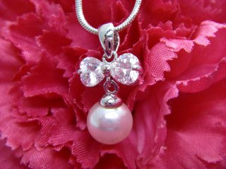 �p�[���ƃL���[�r�b�N�W���R�j�A�̃y���_���g�E�A�N�Z�T���[