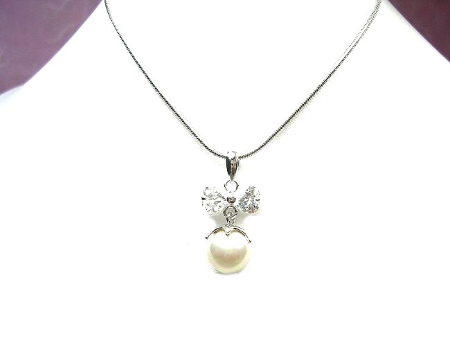 �p�[���ƃL���[�r�b�N�W���R�j�A�̃y���_���g�E�A�N�Z�T���[