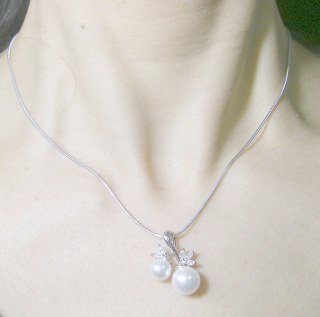 �p�[���ƃL���[�r�b�N�W���R�j�A�̃y���_���g�E�A�N�Z�T���[