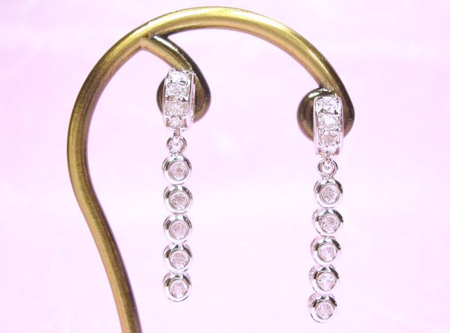 �L���[�r�b�N�W���R�j�A�E�A�N�Z�T���[�@�s�A�X