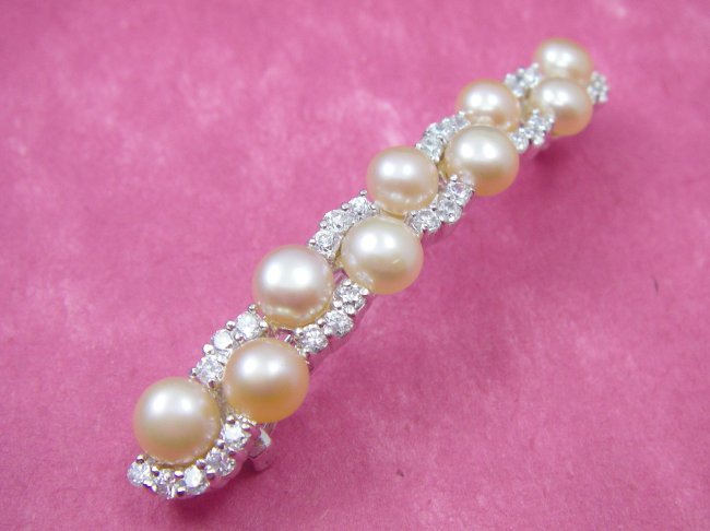 �L���[�r�b�N�W���R�j�A�̃w�A�E�A�N�Z�T���[