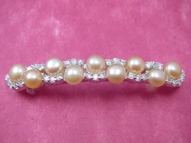 �L���[�r�b�N�W���R�j�A�̃w�A�E�A�N�Z�T���[