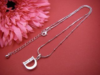 �L���[�r�b�N�W���R�j�A�̃C�j�V���� �y���_���g