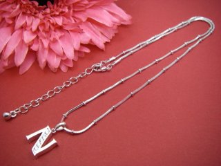 �L���[�r�b�N�W���R�j�A�̃C�j�V���� �y���_���g