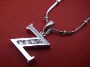 CZ�@�L���[�r�b�N�W���R�j�A�̃y���_���g�@�C�j�V�����@�y���_���g