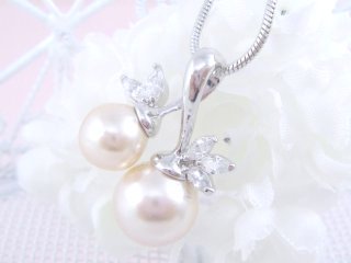 �p�[���ƃL���[�r�b�N�W���R�j�A�̃y���_���g�E�A�N�Z�T���[