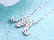 CZ�@�L���[�r�b�N�W���R�j�A�̃y���_���g�@�C�j�V�����@�y���_���g